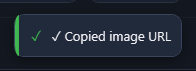 A notification reading Copied image URL, with a green bar on its edge.