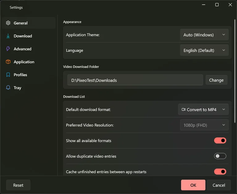 The General tab of Settings showing the application theme, the language, the download folder, the default format and the preferred resolution.